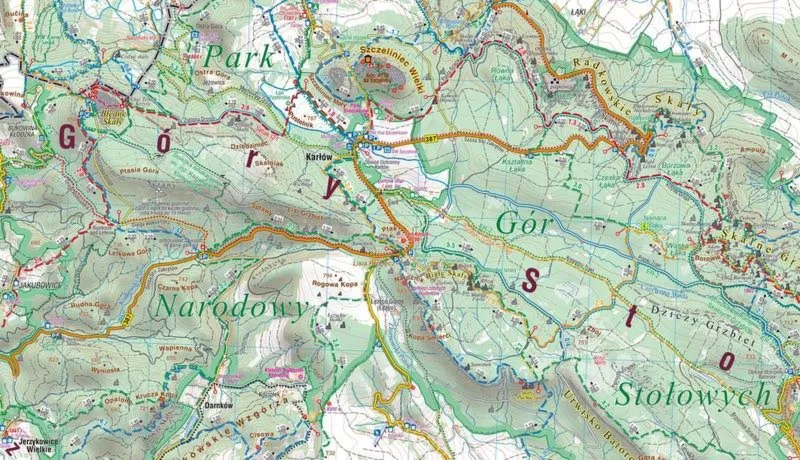 Jak tekst piosenki "Jak dobrze nam zdobywać góry" odkrywa ukryte znaczenie życia w harmonii z naturą?